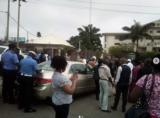 Image result for Police escort suspended NHIS boss into premises